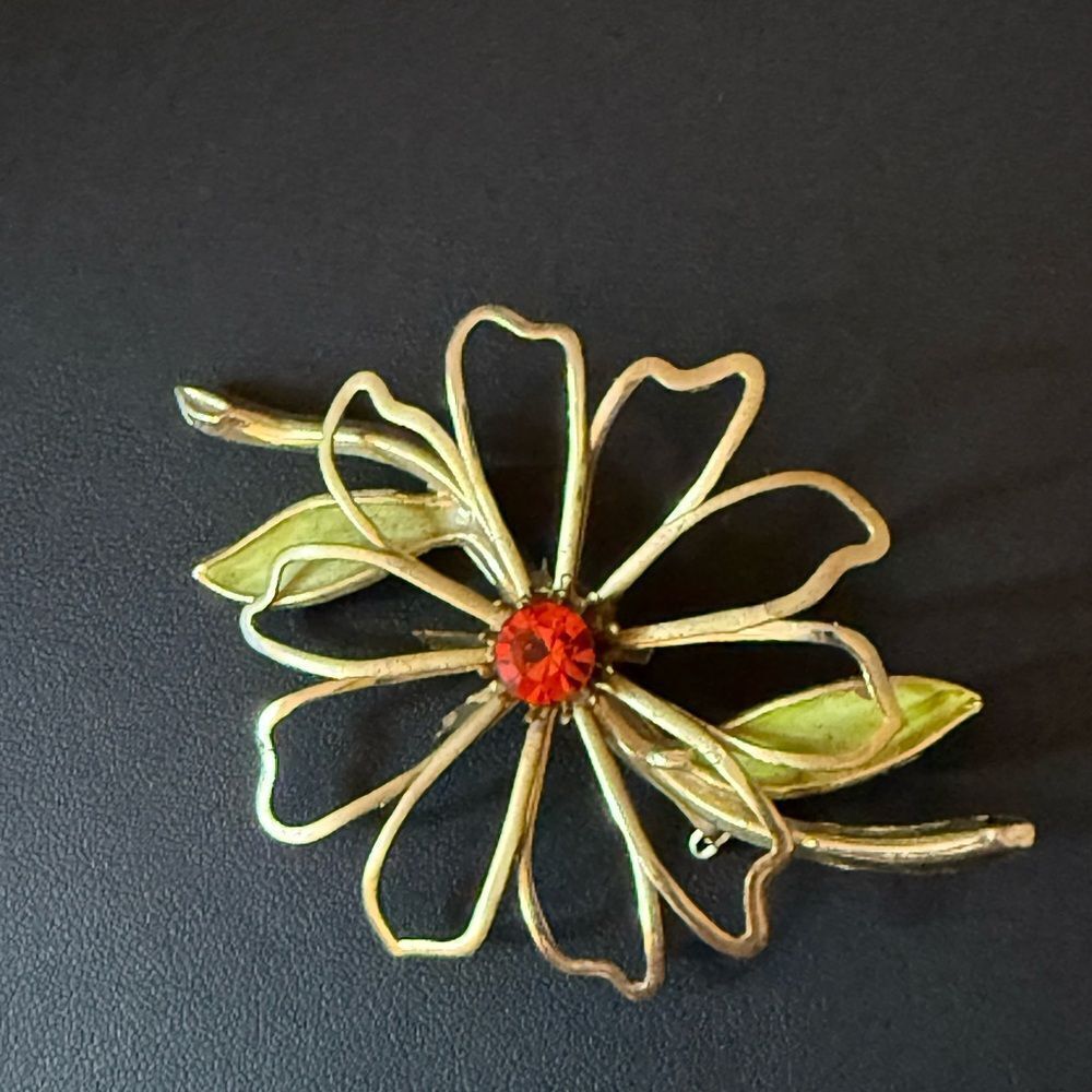 Vintage Enamel Gold-tone Flower Brooch with Red Faceted Crystal center.